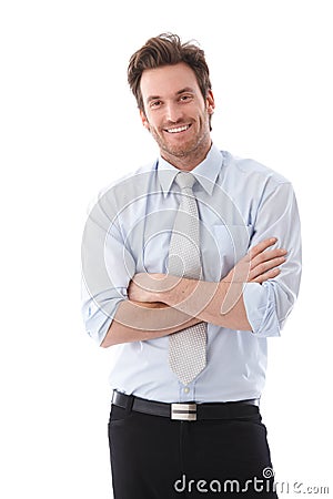 Handsome businessman smiling confidently Stock Photo