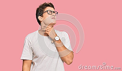 Handsome caucasian man wearing casual clothes and glasses touching painful neck, sore throat for flu, clod and infection Stock Photo