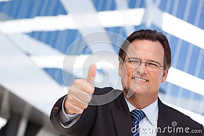 Handsome, Confident Businessman with Thumbs Up Stock Photo