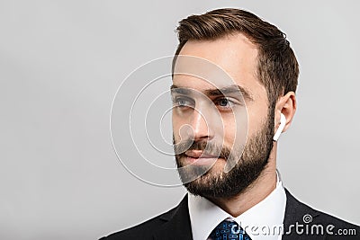 Handsome confident businessman wearing suit standing Stock Photo