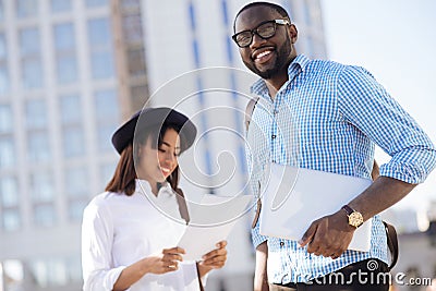 Handsome confident guy seeming very ambitious Stock Photo