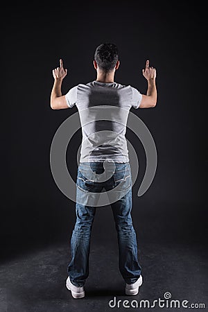 Handsome confident man pressing his fingers to the sensory screen Stock Photo