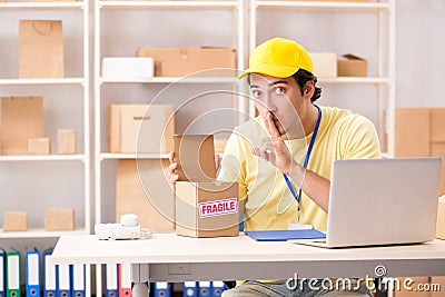 The handsome contractor working in box delivery relocation service Stock Photo