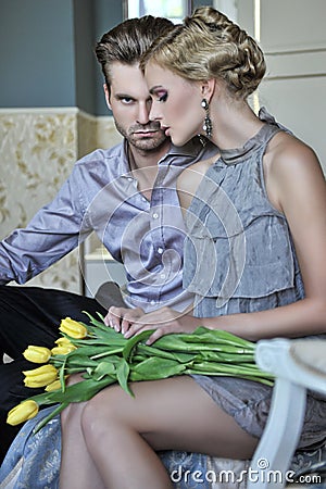 Handsome couple in fashionable room Stock Photo