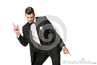 handsome dancing young groom isolated Stock Photo