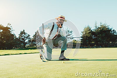 African golf player on the field Stock Photo