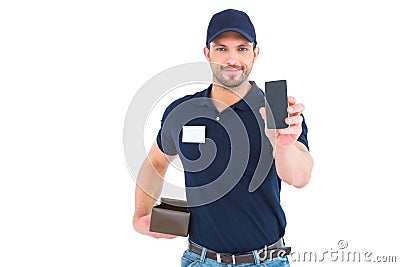 Handsome delivery man showing mobile phone Stock Photo