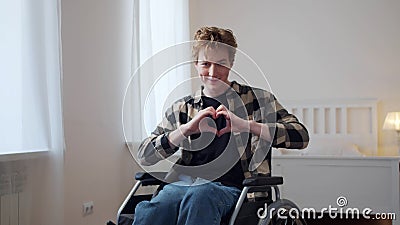 A handsome disabled man is expressing gratitude Stock Photo