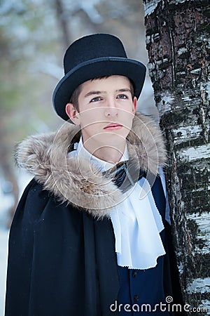 Handsome elegantyoung man with rapier, outdoor Stock Photo