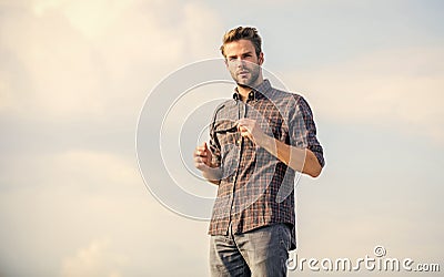 Handsome guy wear sunglasses. Hipster man in trendy sunglasses. Fashionable sunglasses. Ultraviolet protection concept Stock Photo