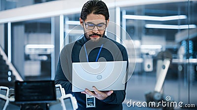 Handsome Hispanic Man Wearing Glasses Smiling and Looking at Camera. Young Intelligent Multiethnic Stock Photo