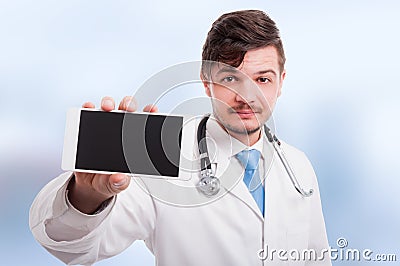 Handsome intern shows the phone with blank screen Stock Photo