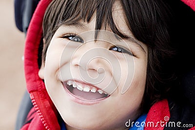 Handsome little boy smiling, closeup Stock Photo