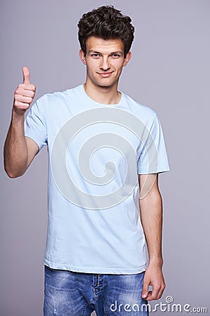 Handsome man in blank blue t-shirt Stock Photo