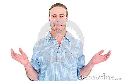 Handsome man crying and gesturing Stock Photo