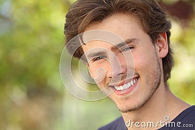 Handsome man face with a white perfect smile Stock Photo