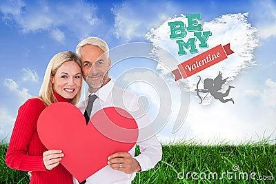 Handsome man getting a heart card form wife Stock Photo