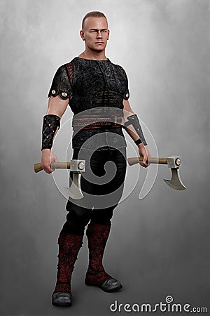 Handsome man in historical medieval style costume holding an axe in each hand Stock Photo