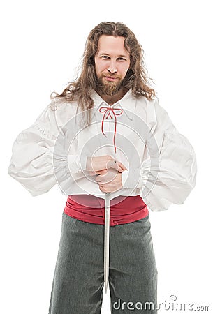 Handsome man in historical pirate costume with dagger isolated Stock Photo