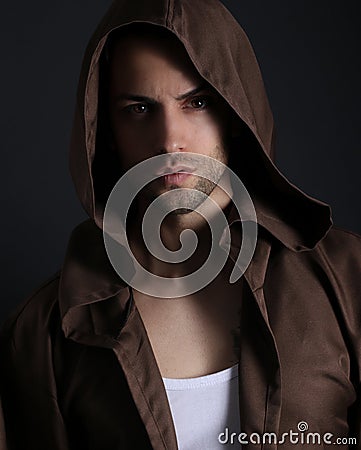 Handsome man with hood Stock Photo