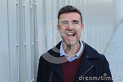 Handsome man laughing out loud Stock Photo