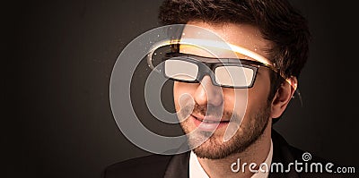 Handsome man looking with futuristic high tech glasses Stock Photo