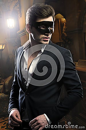 Handsome man in mask Stock Photo