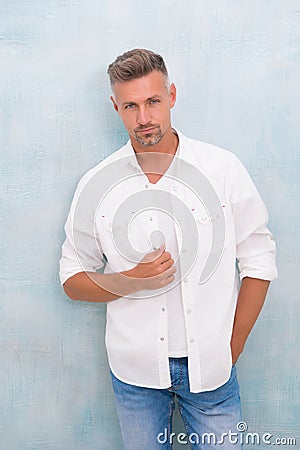 Handsome man perfect white shirt denim pants, barbershop hairdresser concept Stock Photo