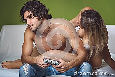 Handsome man playing videogame Stock Photo