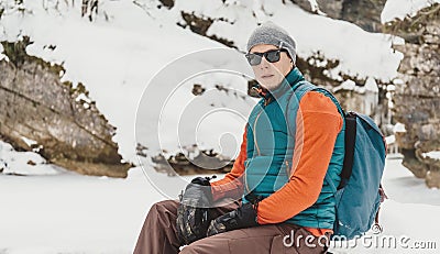 Handsome man resting in winter. Stock Photo