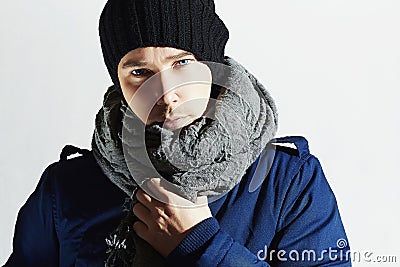 Handsome Man in Scurf. Stylish European Boy with Blue Eyes. Casual Winter Fashion Stock Photo