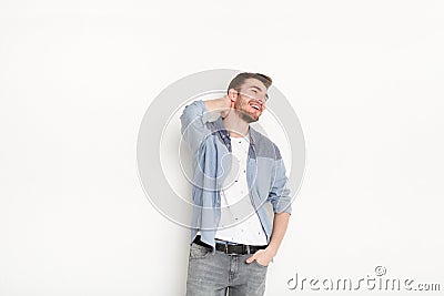 Handsome man touching his hair Stock Photo