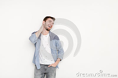 Handsome man touching his hair Stock Photo