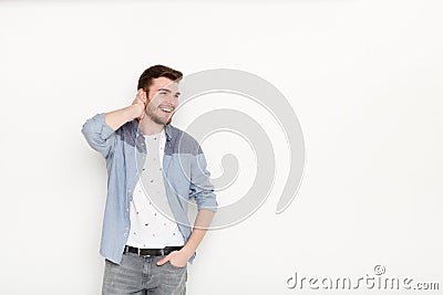 Handsome man touching his hair Stock Photo