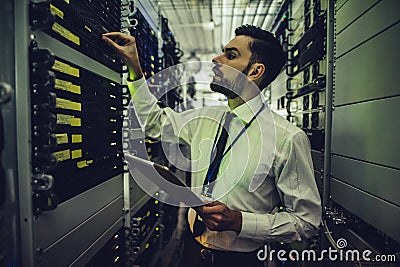 Man in data centre Stock Photo