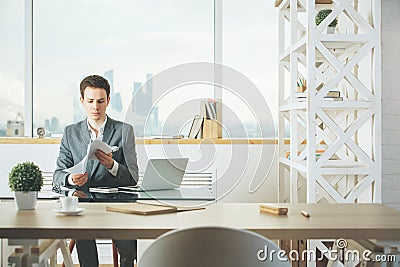 Handsome man working on project Stock Photo