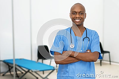 Handsome mature adult afro american male doctor at vaccination station Stock Photo