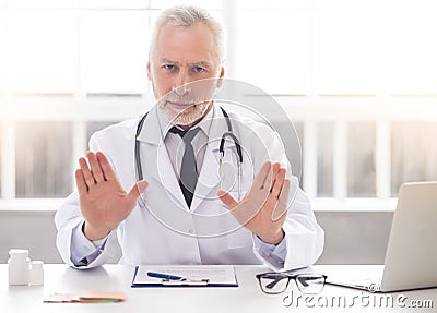 Handsome mature doctor Stock Photo