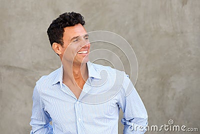 Handsome mature man smiling and looking away Stock Photo