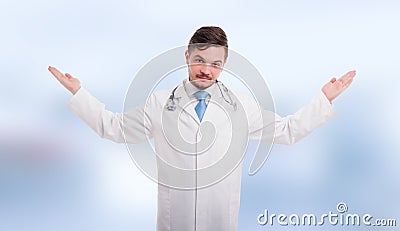 Handsome medic with palms up Stock Photo