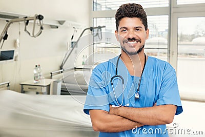 Handsome mexican male nurse or doctor with beard Stock Photo