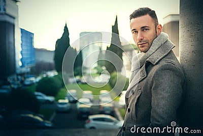 Handsome modern man in the city. Winter mens fashion Stock Photo