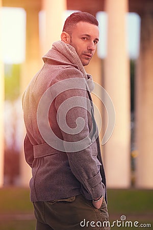 Handsome modern man in the city. Winter mens fashion Stock Photo