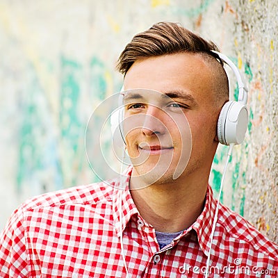 Handsome modern young man listening to music Stock Photo