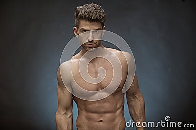 Handsome muscular guy with great hairstyle Stock Photo