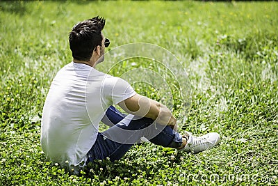Handsome Muscular Hunk Man Outdoor in City Park Stock Photo