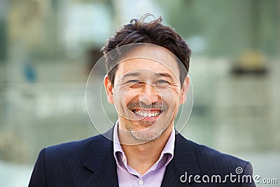 Handsome older man in suit with big smile on his face Stock Photo