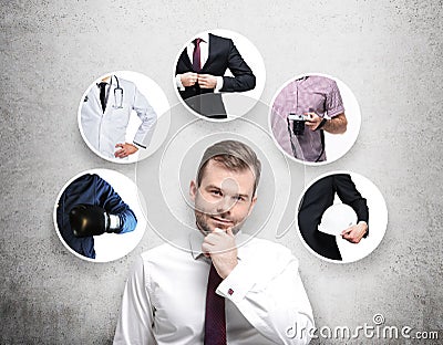 A handsome person in a formal shirt is thinking about different professions. Stock Photo