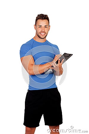 Handsome personal trainer with a clipboard Stock Photo