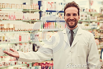 Handsome pharmacist at work Stock Photo